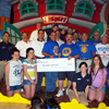 Patchogue Lions Club Hosts “Christmas in June” for Local School Children at Boomer’s Family Fun Center